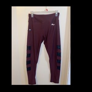 Burgundy/Wine leggings, size small. Never worn but w/out tags.
